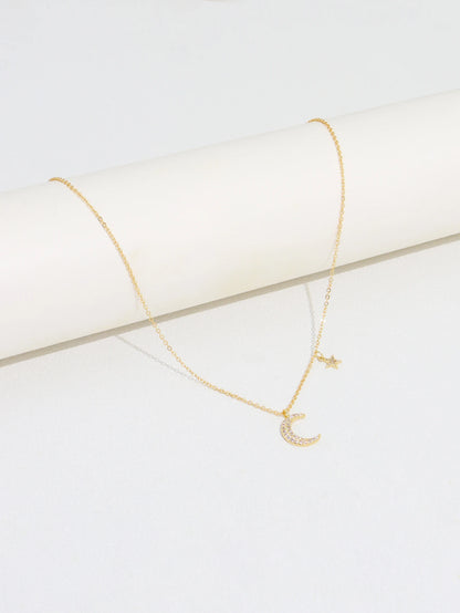 Collier étoile & lune scintillant – pendentif féminin tendance